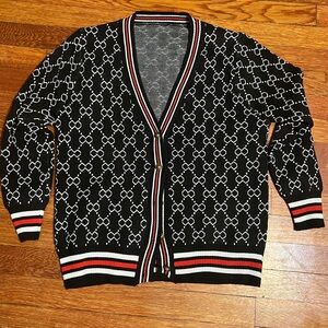 Black, white, red cardigan sweater